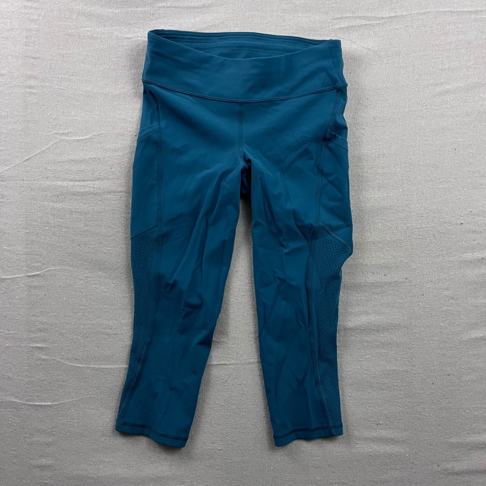 Lululemon Tight Stuff Tight Women 8 Teal Blue Crop Leggings Laser Cut Pockets